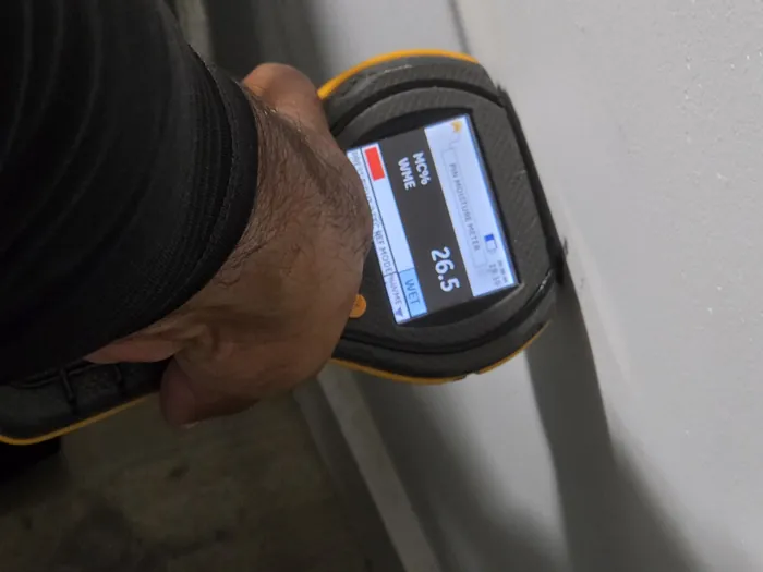 Moisture reading during an AquaSeekers property inspection