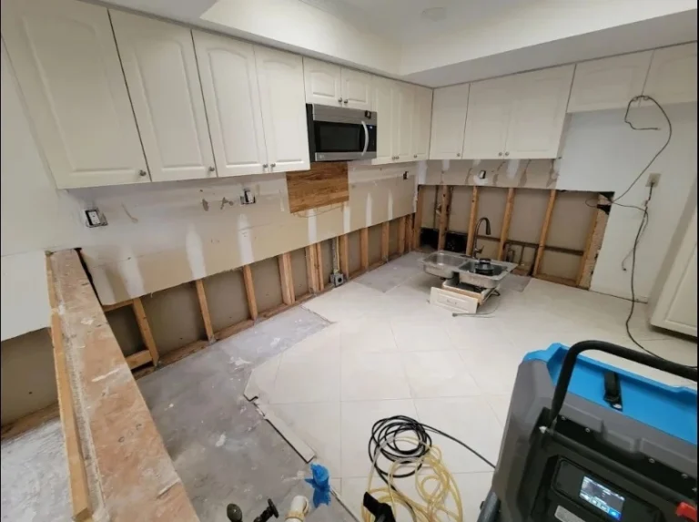 Kitchen with lower wall sections removed to expose wall cavities